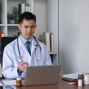 male-doctor-engaged-in-medical-studies-for-advancing-health-care-practices-in-a-modern-clinical.jpg